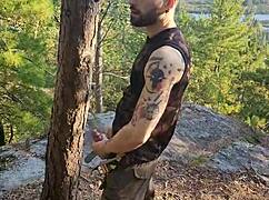 Hairy Tattooed Man Masturbating Outdoors in Forest