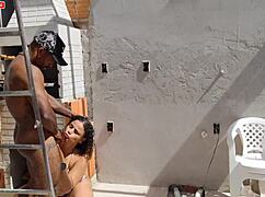 Barbecue girl takes sausage in ass