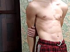 Skinny Boy Flexes Muscles After Study Session