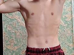 Skinny Boy Flexes Muscles After Study Session