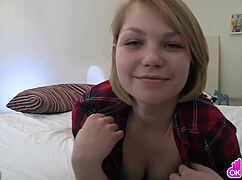 blonde teen playfully strips and teases