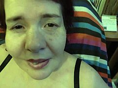 The mature sexy woman caresses herself in a sensual solo session.