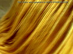 Busty blonde reveals wet shaved pussy and natural big tits