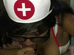 Latina nurse checks young patient