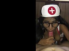 Latina nurse checks young patient