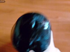 teasing handjob on huge black dildo using sexy gloves