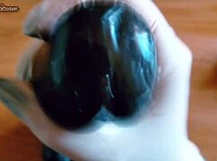 teasing handjob on huge black dildo using sexy gloves