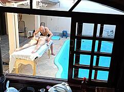 Poolside massage turns into oily handjob blowjob on her wet tits!