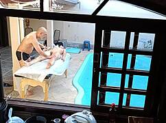 Poolside massage turns into oily handjob blowjob on her wet tits!