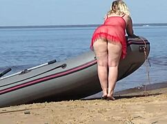 Wow, juicy ass milf struts beach in big natural tits glory!