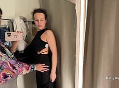 two brunettes sneak kisses in the public locker room