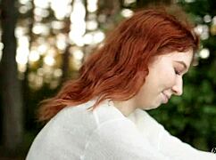 Teen redhead mia fingers shaved pussy to wild orgasm by the lake