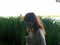 Teen redhead mia fingers shaved pussy to wild orgasm by the lake