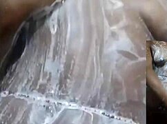 cyndy blackslave squirts tits out in shower masturbation