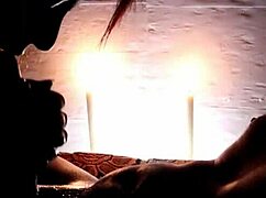 Candlelight glows as she delivers romantic deep blowjob at the party