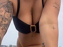 tight yellow bikini splits swollen pussy on crowded beach