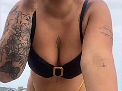 tight yellow bikini splits swollen pussy on crowded beach