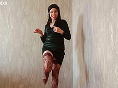 imagine this brunette stripping stockings teasing shaved pussy to climax