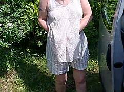 Wanna see this housewife strip naked by the car after beach day?