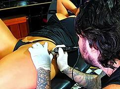Does this brunette milf drive the tattoo artist completely insane?