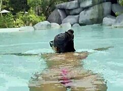 hot monika fox swims pool in pink bikini then struts publicly sexy