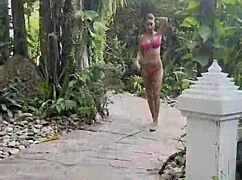 hot monika fox swims pool in pink bikini then struts publicly sexy