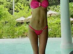 hot monika fox swims pool in pink bikini then struts publicly sexy