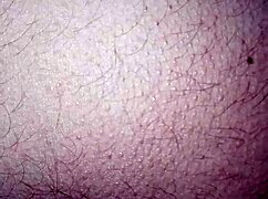 lady poses seductively in intimate close-up session