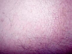 lady poses seductively in intimate close-up session