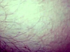 lady poses seductively in intimate close-up session