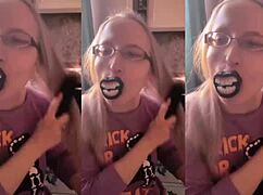 blonde with glasses brushes long hair using lollipop in asmr whispers