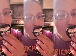 blonde with glasses brushes long hair using lollipop in asmr whispers