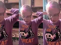 blonde with glasses brushes long hair using lollipop in asmr whispers