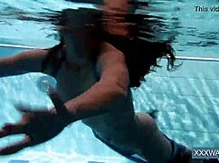 Petra's Shaved Teen Pussy Dives Underwater in Pool Tease