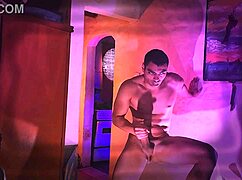 Muscular Stud's Monster Cock Stroked in Purple Orange Striped Tease