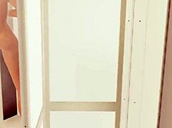 Elise's peepshow explodes with brunette pussy action!