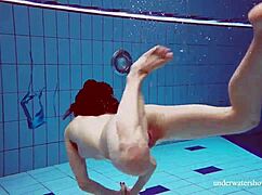 Martina teases in blue bikini her tight pussy flashes underwater at pool beach shower