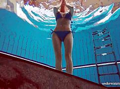Martina teases in blue bikini her tight pussy flashes underwater at pool beach shower