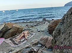 Flashing my pussy on the beach, he fingers me till I squirt in risky public fun