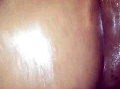 Curious ebony wife oils up for black cock ride?