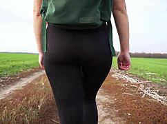 Sexy milf in skin-tight black leggings and spandex struts teasing her perfect yoga ass voyeur style