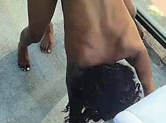 Kashofficials bent over balcony as renity love straps her tight ebony pussy 😈🍑