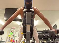 athletic bodybuilder flexes biceps to hoist ladies during outdoor workouts