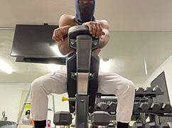 athletic bodybuilder flexes biceps to hoist ladies during outdoor workouts