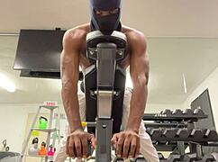 athletic bodybuilder flexes biceps to hoist ladies during outdoor workouts