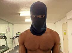 athletic bodybuilder flexes biceps to hoist ladies during outdoor workouts