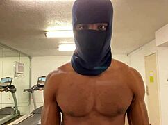 athletic bodybuilder flexes biceps to hoist ladies during outdoor workouts