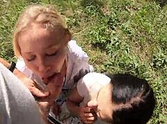 Neighbors smoke then share sloppy mouthful in forest