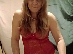 mature housewife slave flashes natural tits in red body stockings