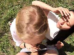 Neighbors smoke then share sloppy mouthful in forest